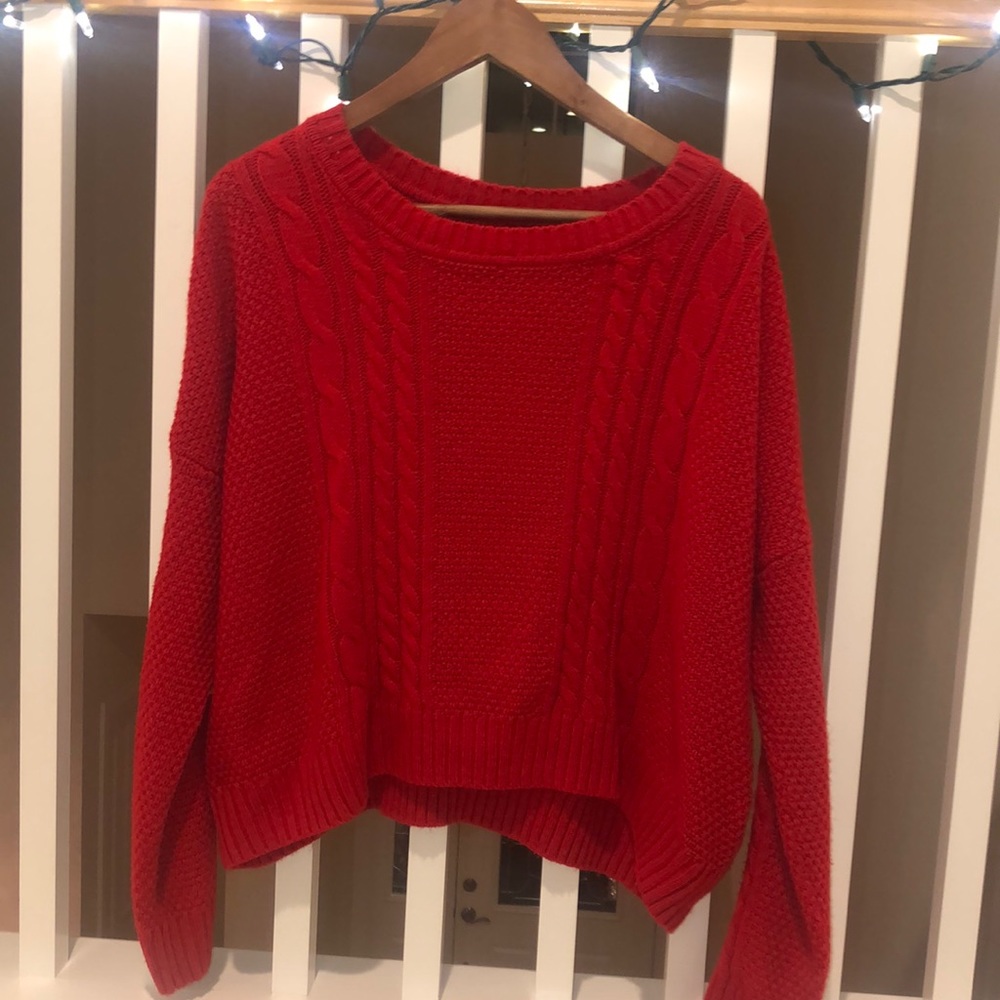 Women’s red cableknit sweater